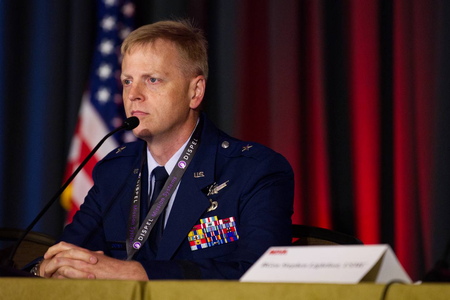 U.S. Air Force Brig. Gen. Luke Cropsey, a key player in the service's Joint All-Domain Command and Control efforts, listens to a question at a National Defense Industrial Association event July 18, 2023.